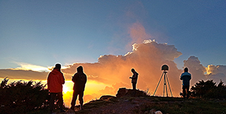 Staff work together at sunset. (Photo by Hsieh Hsin-tien)