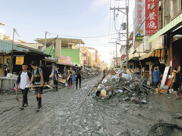 Volunteers from across Taiwan help clear debris in Guangfu Township, Hualien County, after Typhoon Ragasa caused severe damage in September 2025. (Photo by Krakias Kai)
