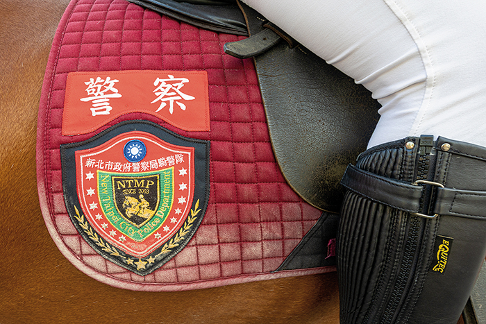 Horses on duty bear the NTMP's badge. (Photo By Chen Mei-ling)