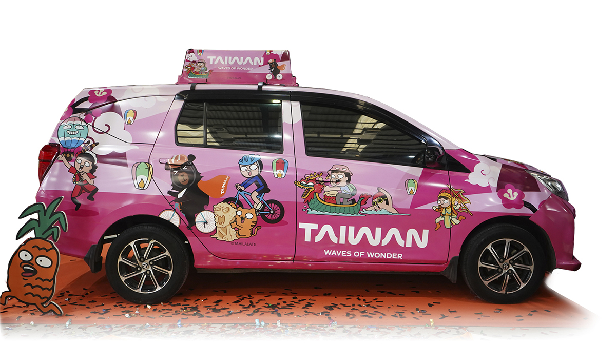 Promotional decals on a taxi in Indonesia are part of the TAIWAN: Waves of Wonder campaign. (Courtesy of TA)