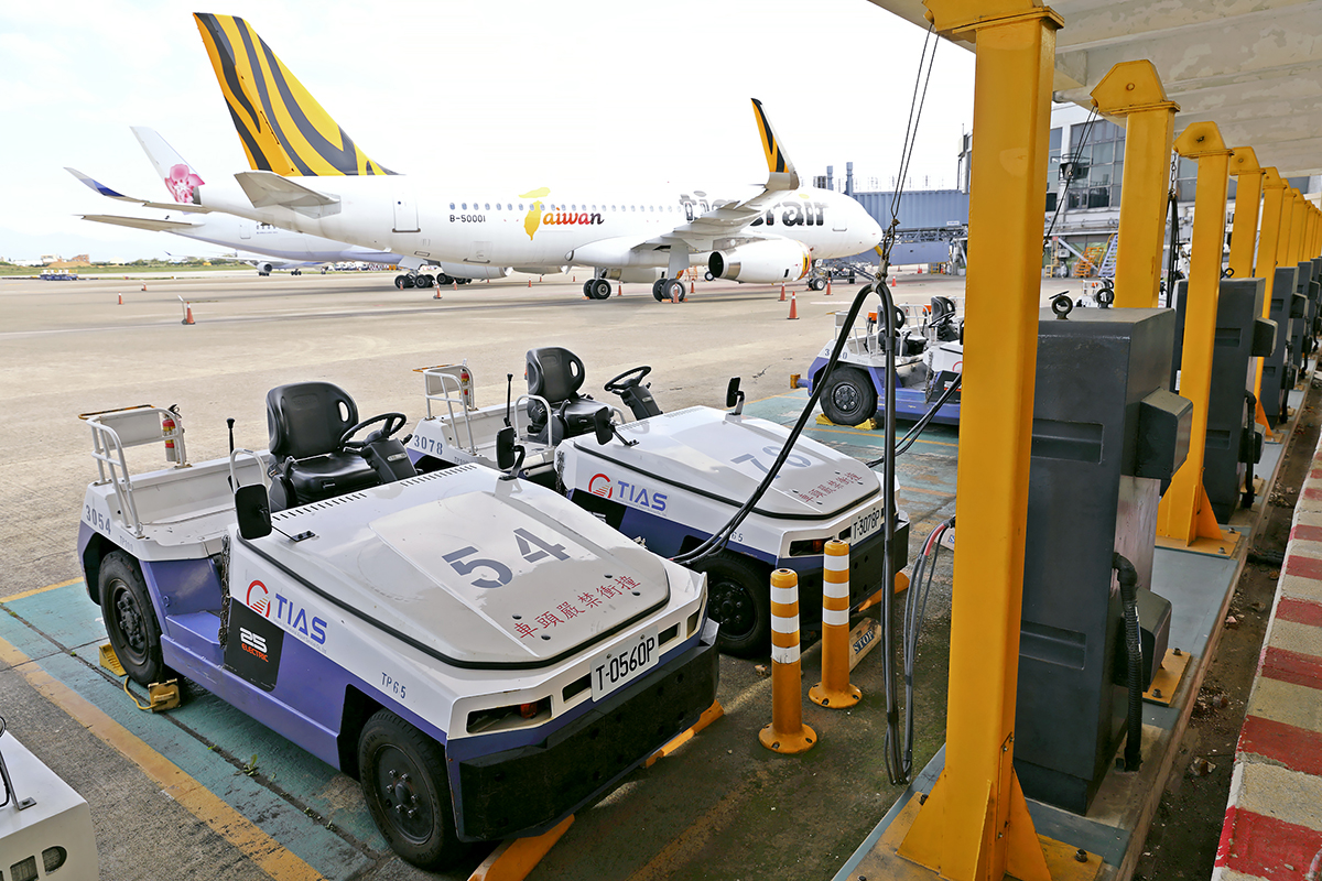 Electric baggage tractors at TTIA contribute to the facility’s lower need for fossil fuels. (Courtesy Of TTIA)