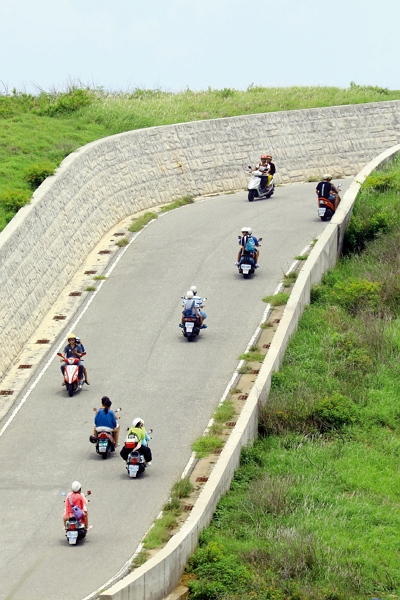 The most convenient way to travel around the island is by motorcycle.