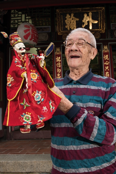 With a puppet on his hand, Chen’s face comes alive. He and the puppet mirror one another, like old friends.