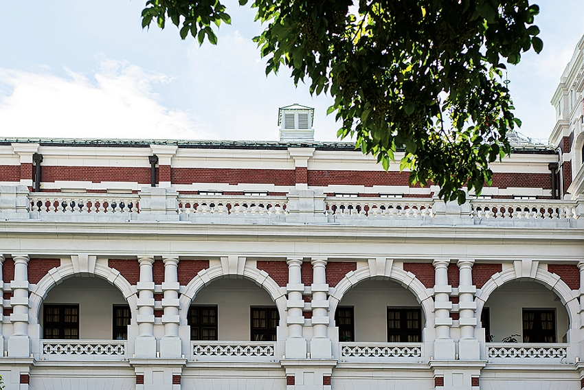 The century-old structure’s arches and arcades, and the façade’s alternating red and white ornamentation, are among the Presidential Office Building’s most arresting features.