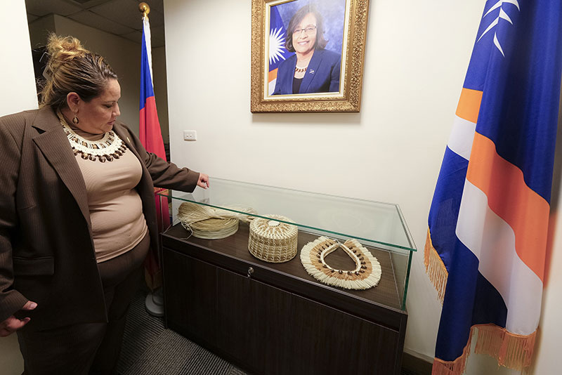 The Marshall Islands embassy in Taiwan has a display of representative Marshallese handicrafts. The photo on the wall shows the tenth RMI president, Hilda Heine.