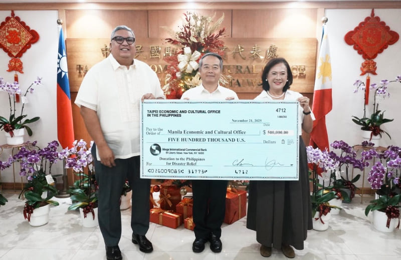 Ambassador Wallace Chow handed over USD500,000 cash donation for humanitarian assistance to MECO Chairperson Corazon Padiernos. MECO Board Member Atty. Joseph Castillo witnessed the handover.